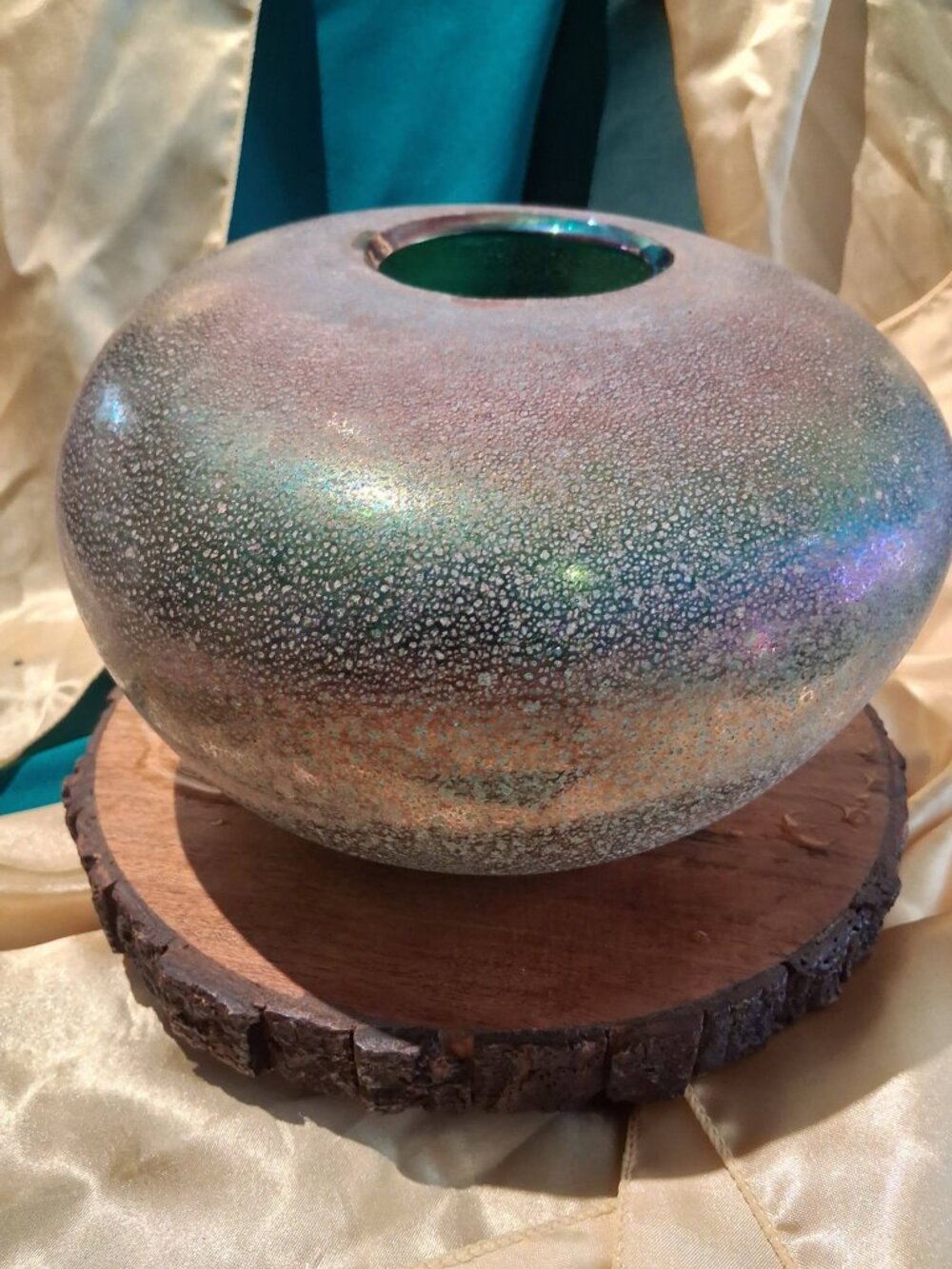 Stunning vintage art glass globular vase featuring an iridescent speckled finish
